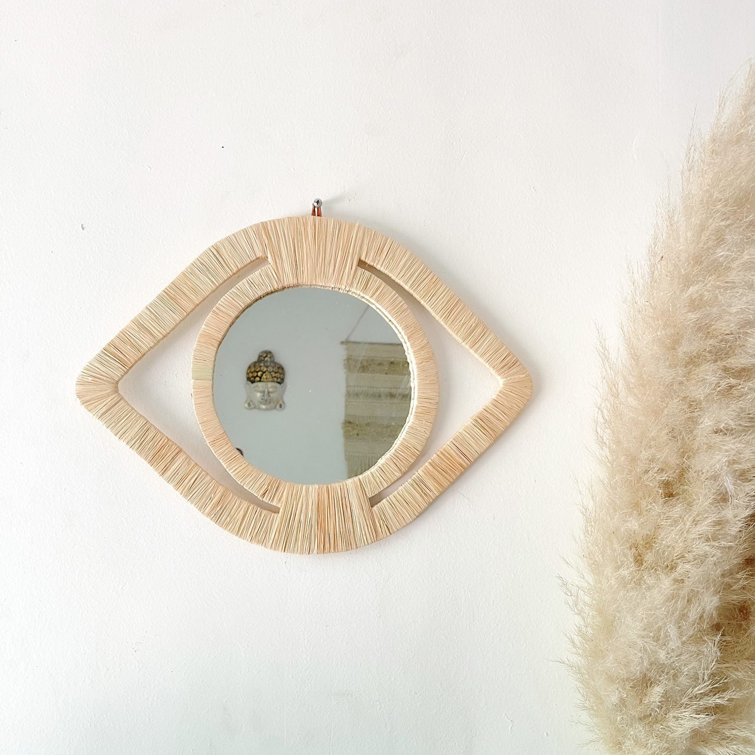 espejo-de-rafia-en-forma-de-ojo-1